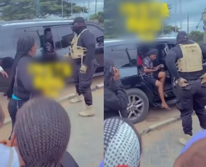 Graduating Female Student Storms School With Hefty Bodyguard (Video)